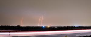 Lightning Strikes Next to Highway Panorama